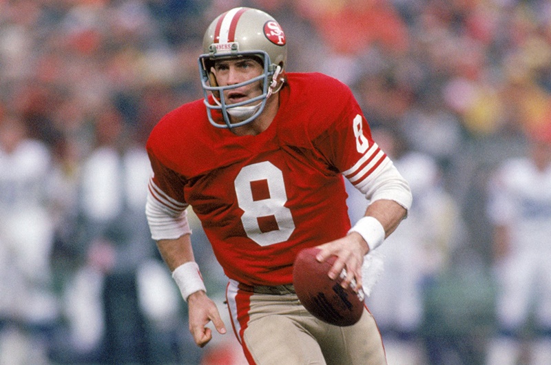 Steve Young: Running with the ball.